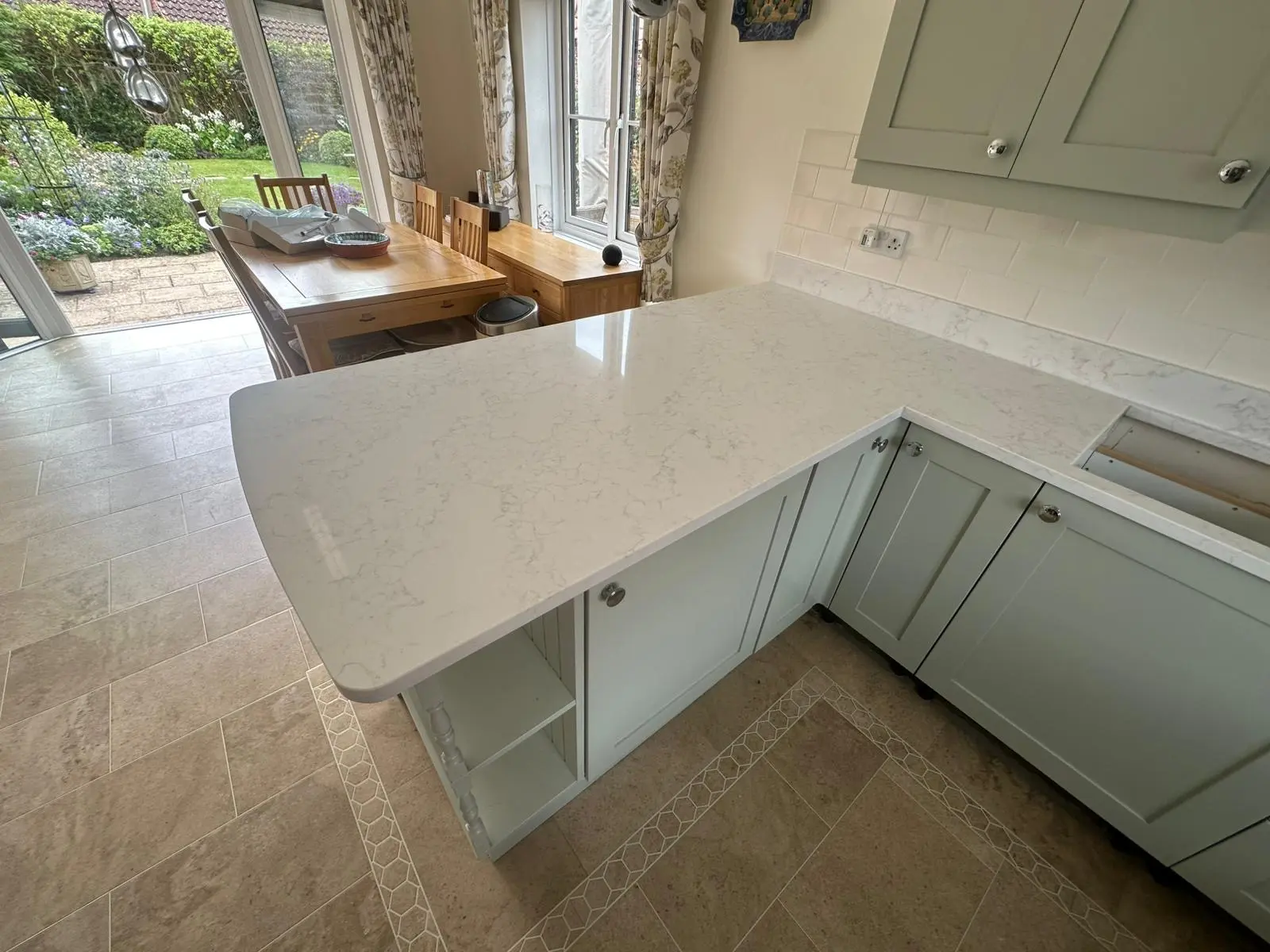 L-shaped marble kitchen worktop fitted in a Norwich home