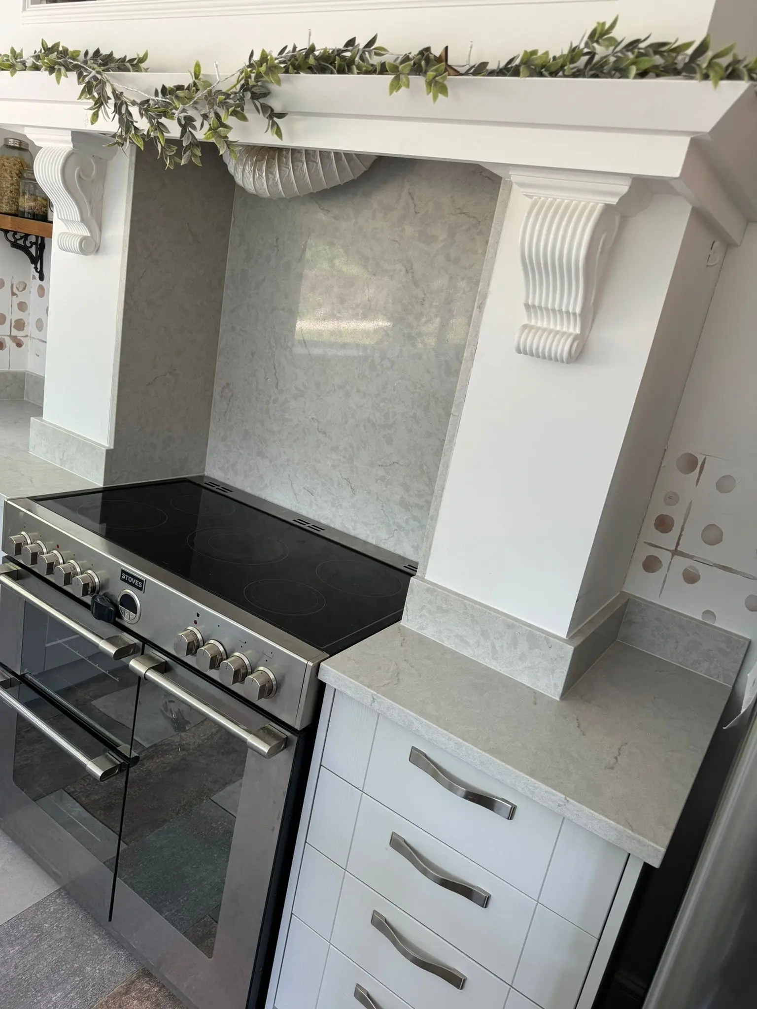 Marble splashback behind an oven in Bury St Edmunds