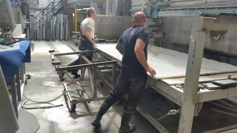 The Marble Works team sorting Corex templates for kitchen worktops