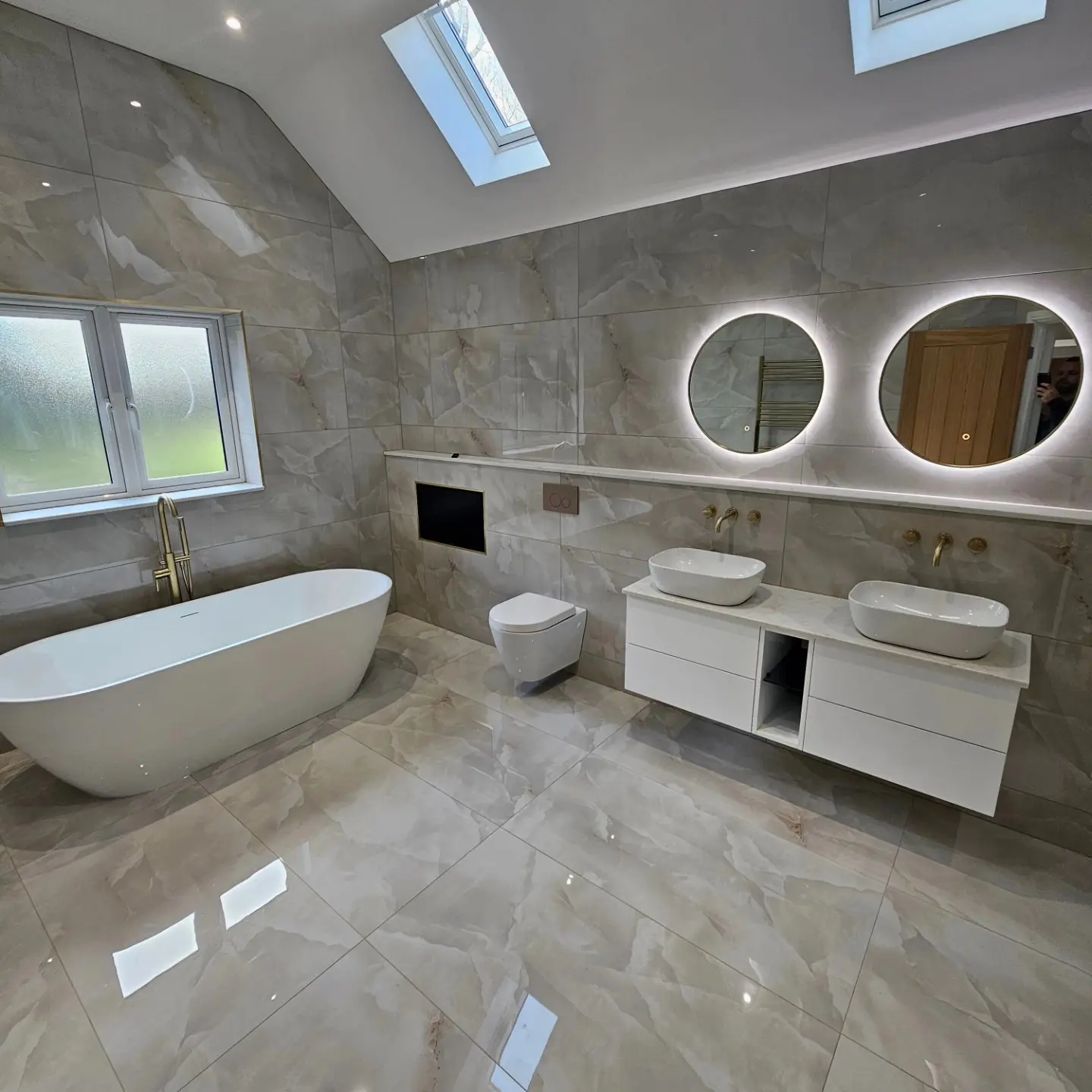 Bathroom with marble walls and floors