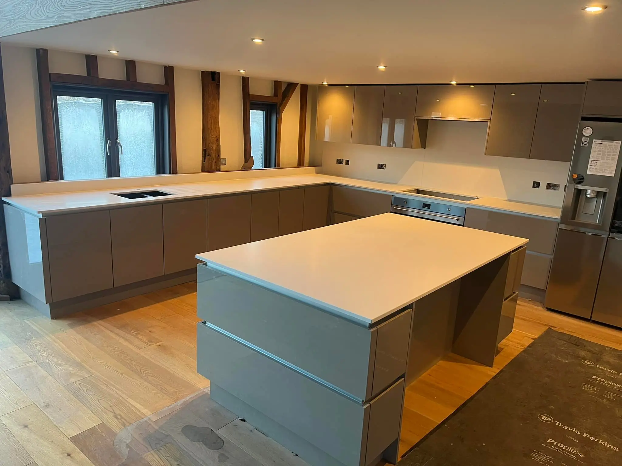 Kitchen island with a white granite top
