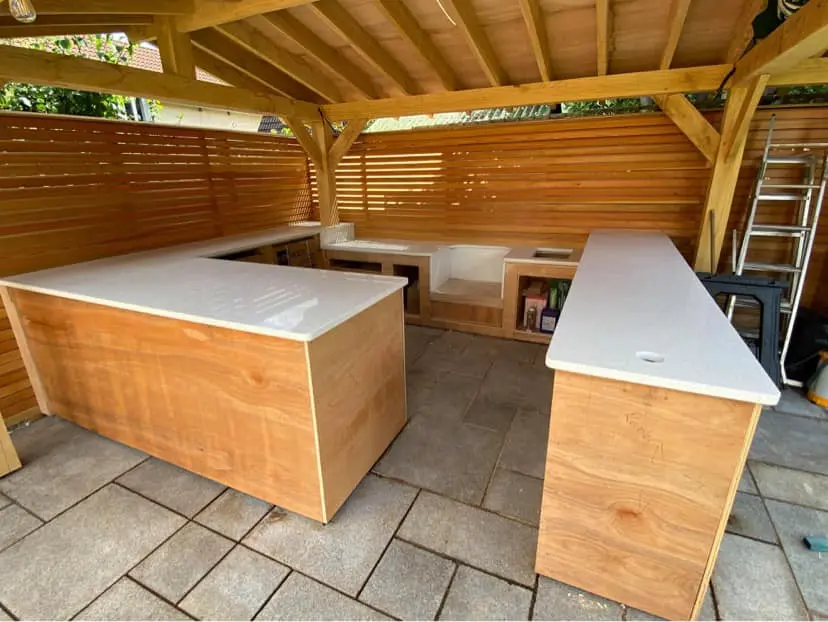 Outdoor kitchen worktop fitted in a garden entertaining area