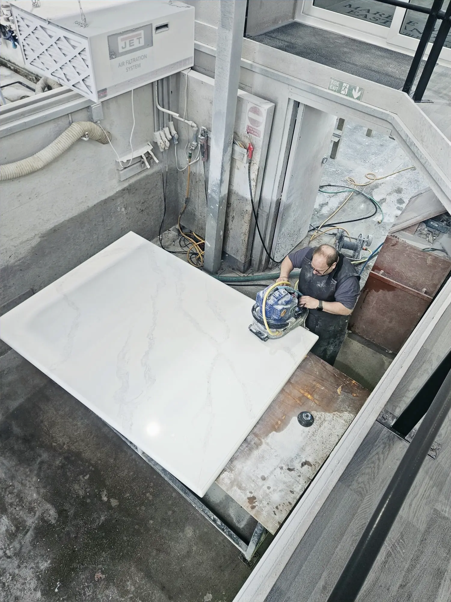 White marble being polished in The Marble Works workshop in Ipswich