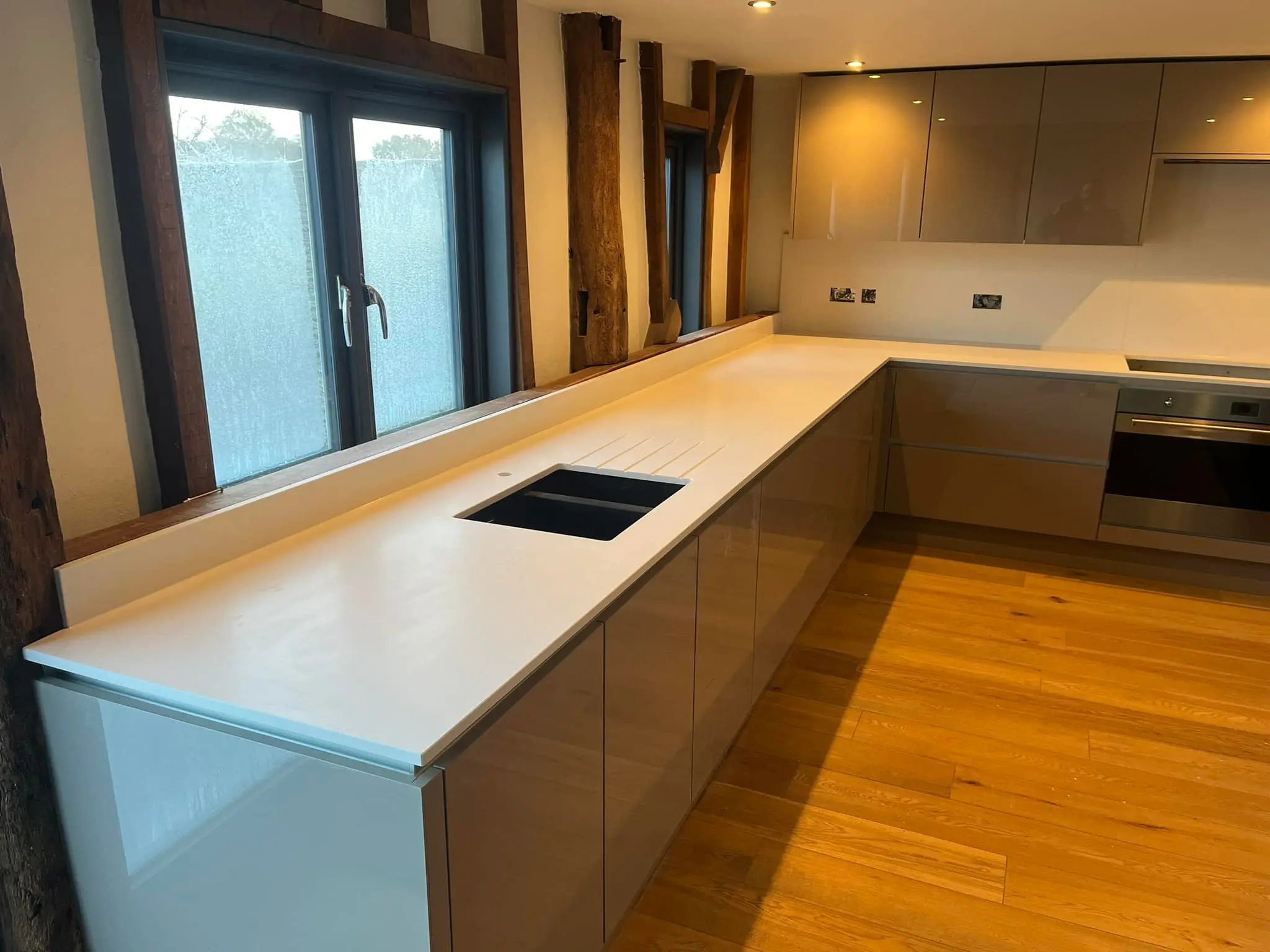 White stone counters in a modern kitchen